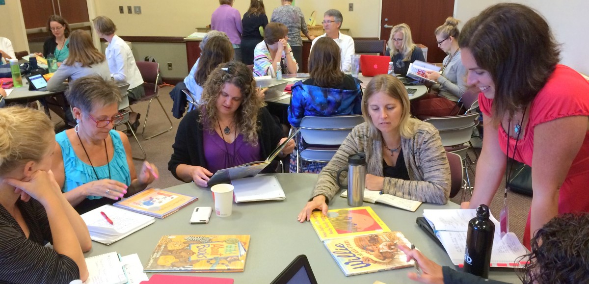Photo of educators doing content analysis of picture books